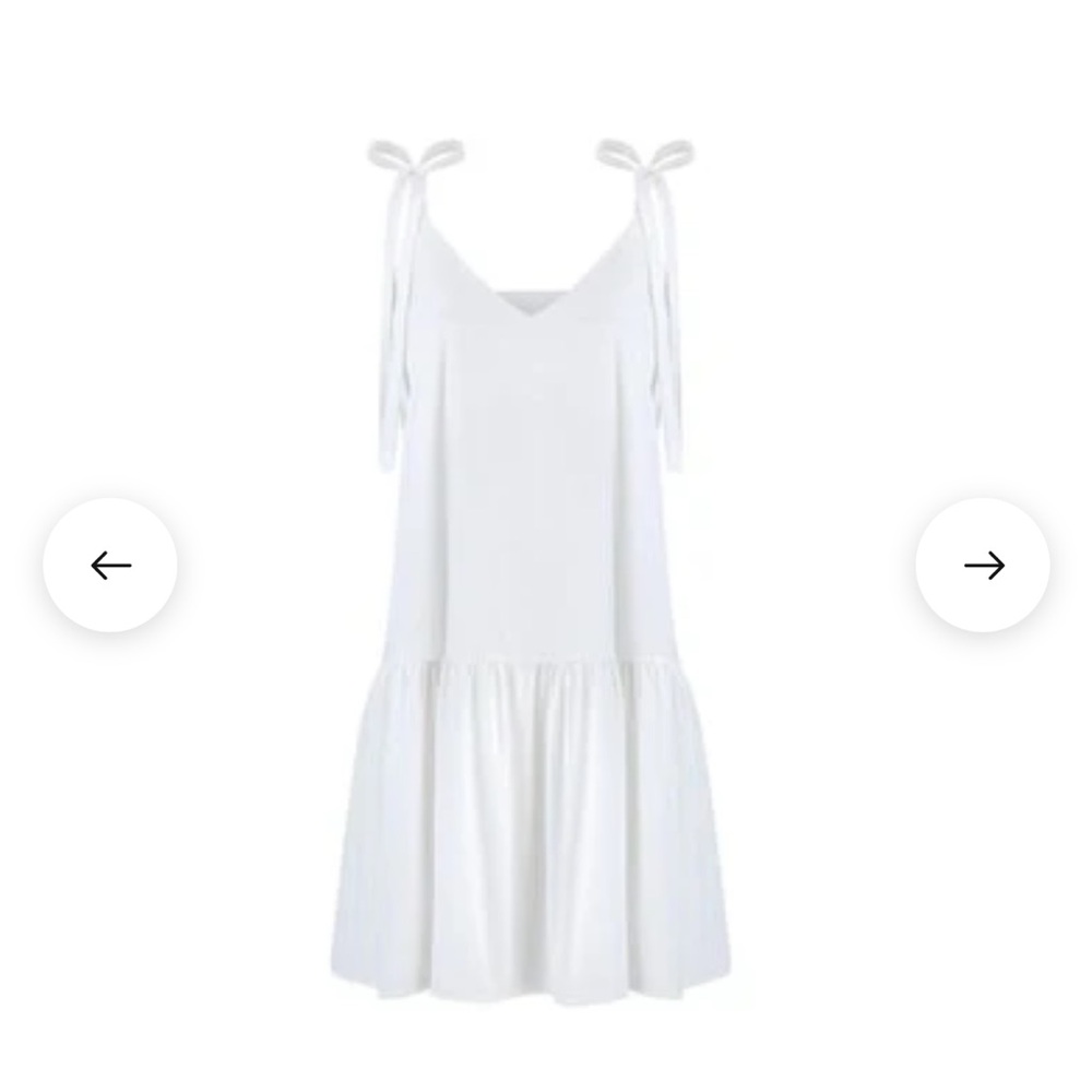 Monica Nera Margo white shoulder tie dress. 

Size small.